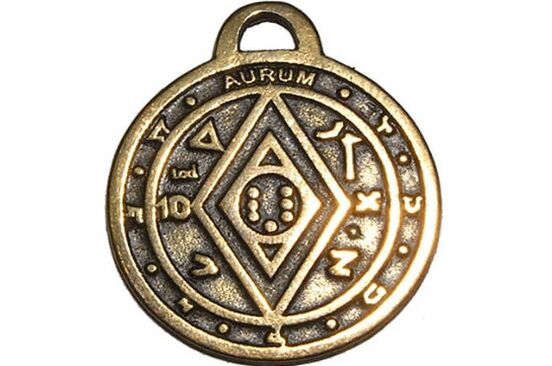 an amulet of coins for happiness and wealth