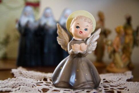 a figurine of an angel as an amulet of happiness